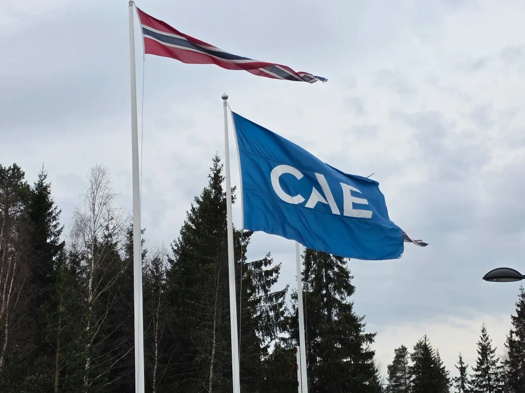 CAE flag and Norwegian flag at the Oslo training centre